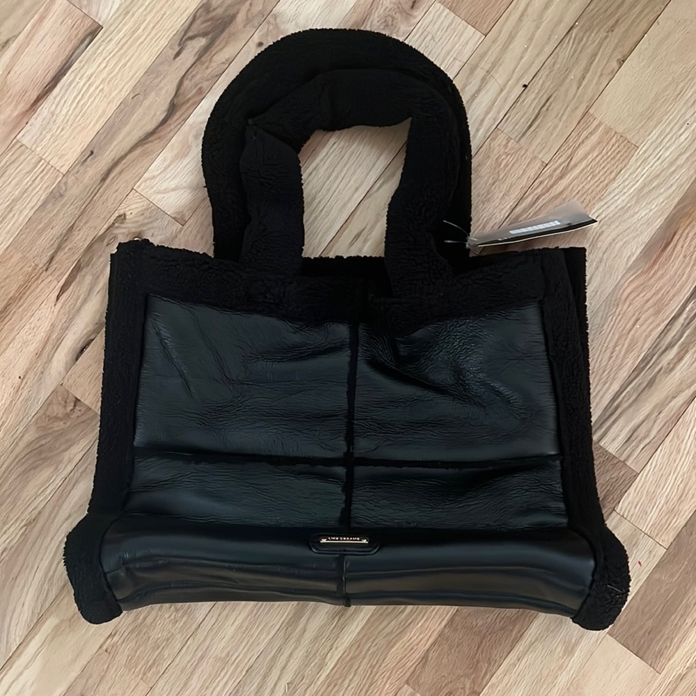 Cute Sherpa tote bag, ordered 2 by accident and can’t return